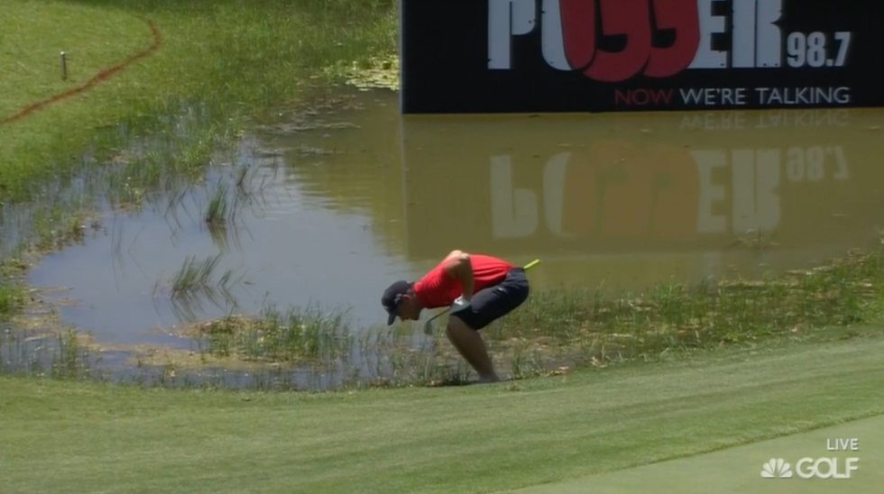 A few holes later, he sends another one in the hazard.